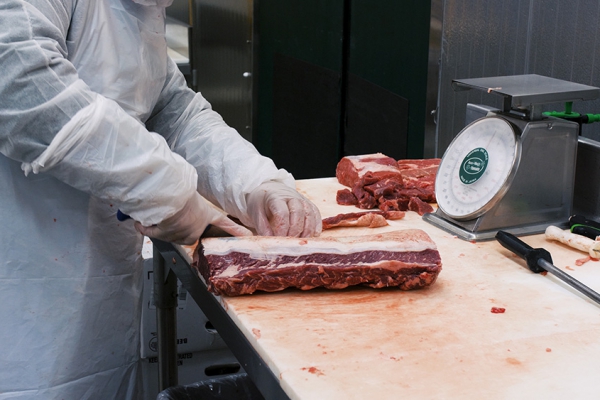 Cutting Meat at Exceptional Foods