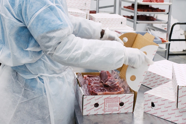 Packaging Meat at Exceptional Foods